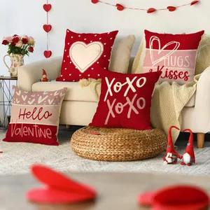 Set of four Valentine's Day throw pillow covers with romantic heart and XOXO designs