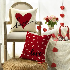 Two festive Valentine's Day pillowcases with red hearts and 'Love' typography