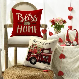 Festive red and cream holiday throw pillow covers styled in a cozy living room scene