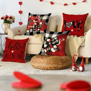 Valentine's Day throw pillow covers with heart and truck designs on a cozy sofa