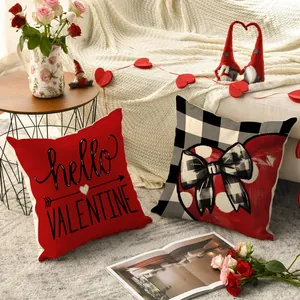 Detail view of Valentine's Day pillow covers with heart and buffalo check patterns