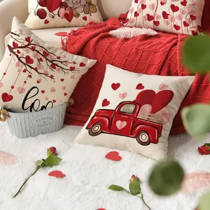 Valentine's Day cushion covers featuring romantic heart and red truck designs in cozy home setting