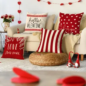 Festive set of four Valentine's Day red and cream heart pattern sofa cushion covers