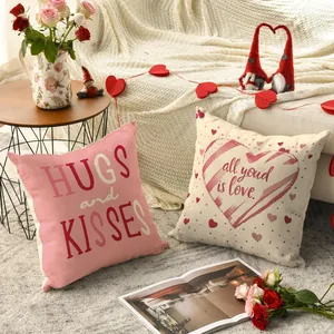 Romantic Valentine's Day heart-themed cushion covers displayed in a cozy home setting
