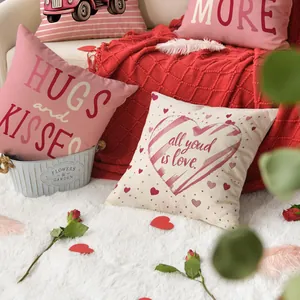 Valentine's Day throw pillow covers set with heart patterns in a cozy home setting