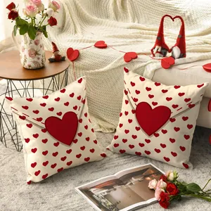 Romantic Valentine's Day pillowcases with red heart patterns in a cozy home setting.