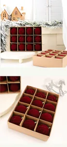 Close-up of 12-pack 6cm flocked burgundy Christmas balls with velvet textures.
