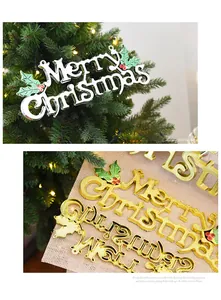 Detailed view of gold and silver Merry Christmas letter signs for holiday decor