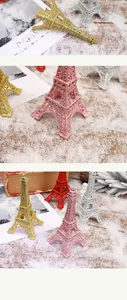 Detailed view of colorful glittery Eiffel Tower miniatures for Christmas table decor