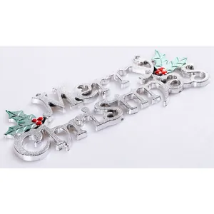 Silver Merry Christmas hanging sign with green holly leaves and red berry details