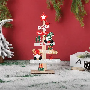 Wooden Christmas tree desk ornament with gnomes and 'Merry Christmas' text for holiday decor