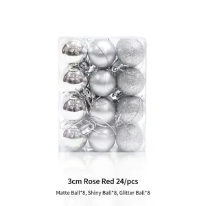 Detailed view of 24 silver Christmas balls in matte, shiny, and glitter finishes