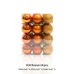 Set of 24 bronze Christmas ornaments featuring matte, shiny, and glitter finishes