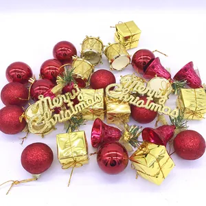 Complete 32-piece Christmas decoration set featuring red glitter balls and golden drums