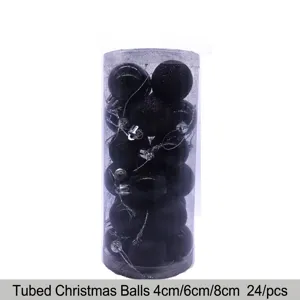 24-piece set of assorted black Christmas baubles in a clear plastic storage barrel