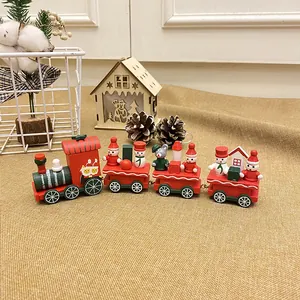 Detailed close-up of a decorative red wooden Christmas train with Santa and snowmen