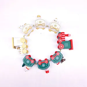 Detailed view of a festive wooden Christmas train toy ornament set in a circle