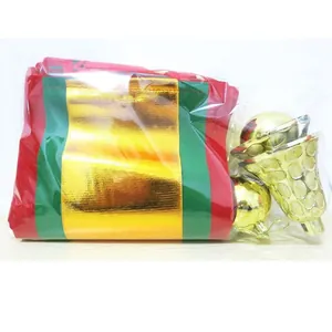 Christmas wavy flag banner set with gold plastic bells and balls for festive decoration