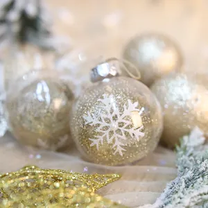 Palle di Natale trasparenti da 8 cm con fiocchi di neve bianchi e glitter dorati interni