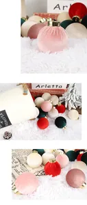 Variety of velvet Christmas ball ornaments with soft textures and elegant colors