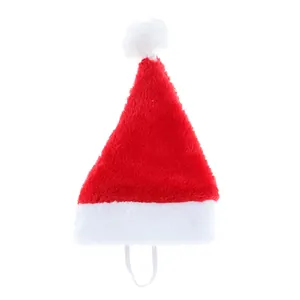 Festive red plush Christmas hat for pets featuring a white pom-pom and elastic chin strap