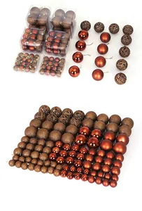 Detailed view of 100pcs brown Christmas ornaments set with mixed textures and sizes