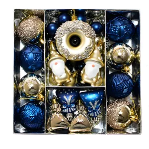 Assorted blue and gold Christmas ornaments set featuring gnomes and a doughnut shape.