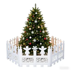White Christmas tree fence with angel cutout and Peace lettering for holiday decor