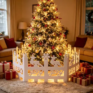 Detailed close-up of white PVC Christmas tree fence with reindeer and joy cutouts