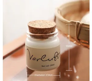Detailed close-up view of 20ml travel scented candle jar with dimensions 55mm by 37mm.