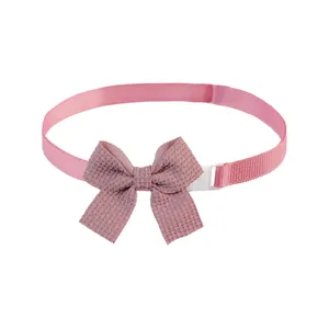Chic pink waffle texture pet bowtie collar with adjustable white buckle for cats