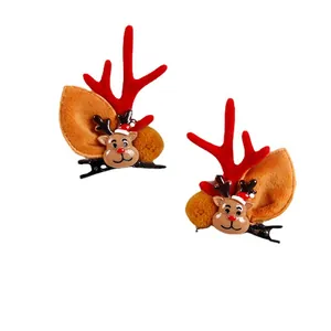 Adorable pair of Christmas reindeer antler hair clips with 3D plush ears and deer