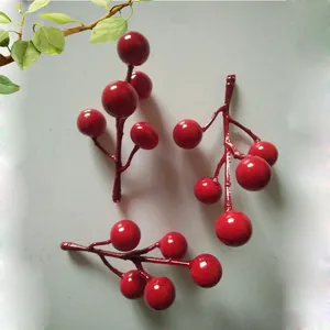 Artificial red berry stems for Christmas and holiday home floral decorations