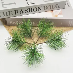 Artificial pine needle branches for DIY Christmas tree decoration and festive home crafts