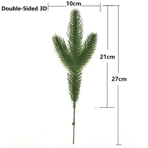 Detail of artificial 3D pine branch showing 10cm width and 27cm height measurements