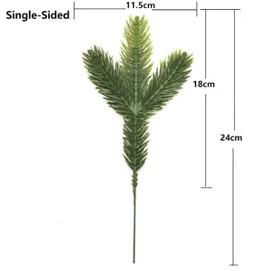 Artificial pine branch detail with 24cm length and 11.5cm width dimensions
