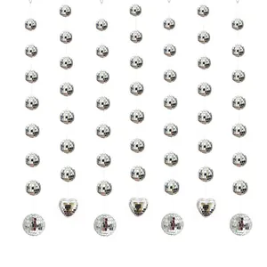 Hanging silver disco ball mirror strings for festive party and curtain decoration.