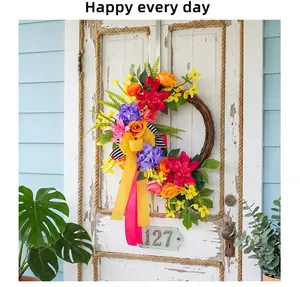 Handcrafted spring floral wreath with colorful ribbons on a rustic white front door