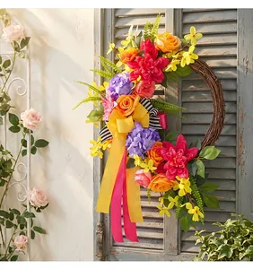 Vibrant spring flower wreath featuring colorful roses and hydrangeas on rustic door
