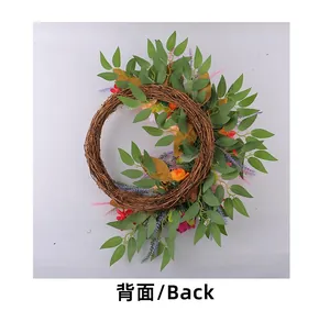 Back view of artificial peony wreath showing the sturdy natural vine base