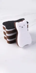 Detail of 3-layer cat shaped dishwashing sponge with scouring pad for kitchen cleaning