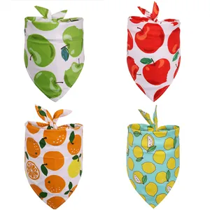 Set of four cotton pet bandanas with vibrant fruit patterns like apple, orange, and lemon.
