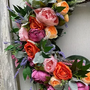 Pink and orange peony floral wreath with lavender for autumn front door decoration