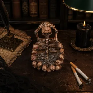 Intricate gothic skeleton ribcage ashtray figurine for dark Halloween home table decor