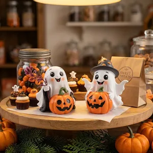 Festive Halloween ghost resin figurines holding pumpkins for cozy tabletop decoration