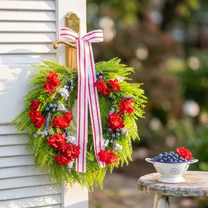 Vibrant red hydrangea and blueberry front door decorative wreath with striped ribbon
