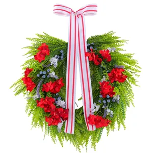Artificial American style wreath with red hydrangeas, blueberries and ribbon bow