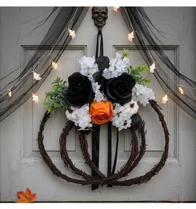 Elegant Halloween pumpkin floral wreath with black and orange roses on door decor