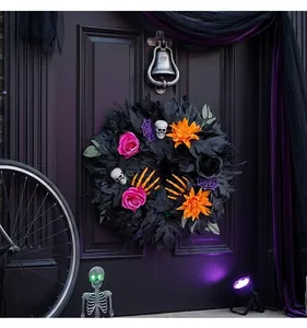 Spooky Halloween wreath with black leaves, skulls, and roses on a dark door front