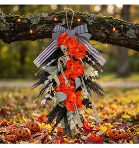 Halloween skeleton wreath featuring vibrant orange hydrangea flowers and striped bow detail
